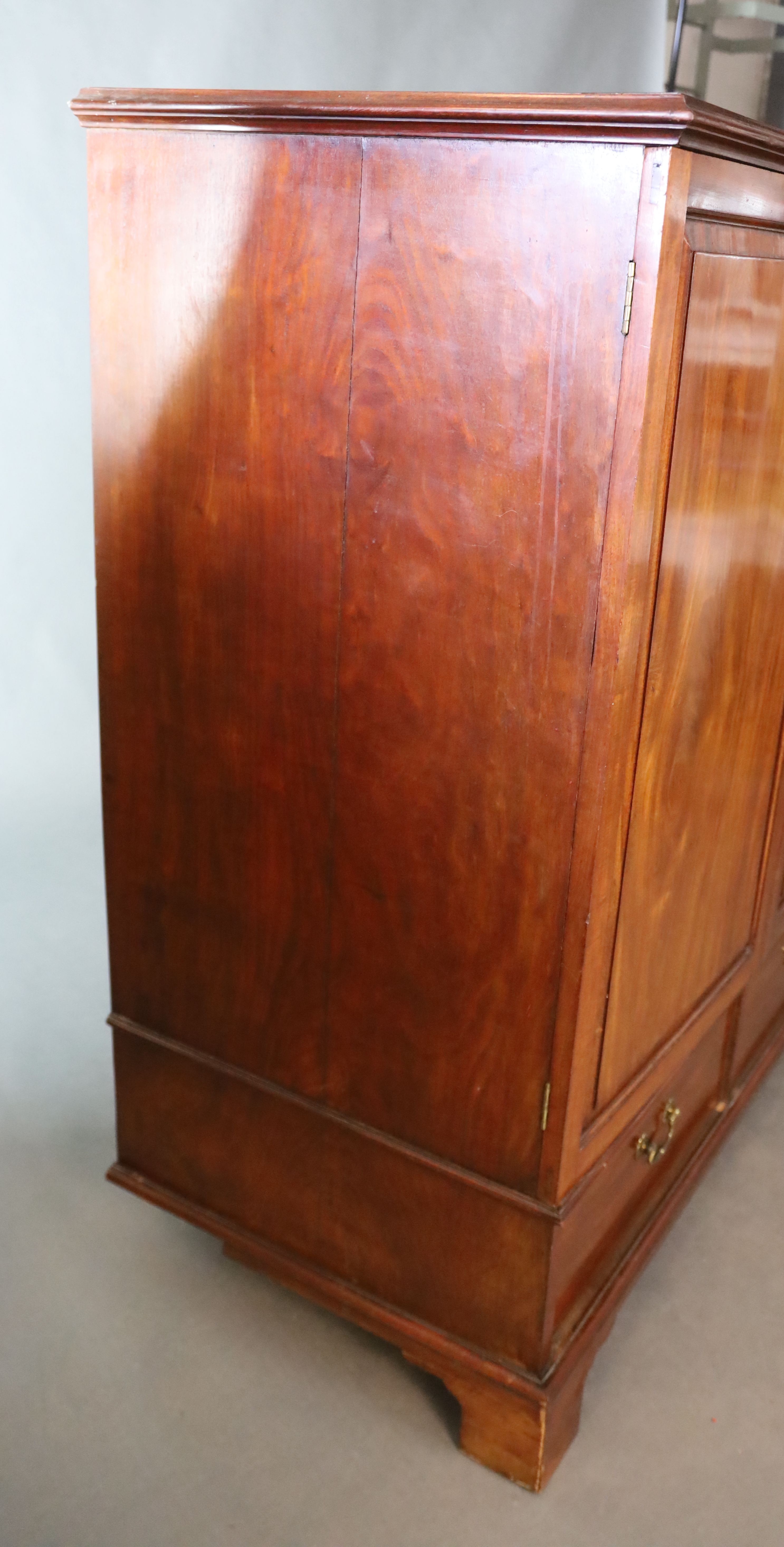 A George III mahogany press cupboard, W.127.5cm D.66cm H.145cm